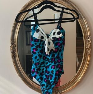 Punk, leopard, polka dot one piece bathing suit.